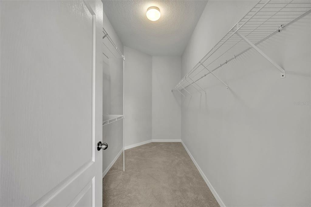 3201 Sonesta Court, Unit A Clermont, FL 34711 - Photo 25 of 34 a view of a hallway