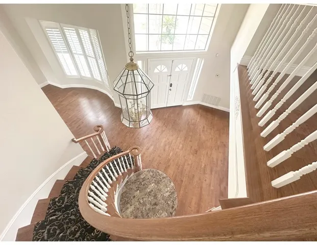 a view of entryway with wooden floor