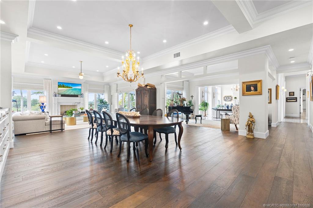 3 Island Road Stuart, FL 34996 - Photo 15 of 58 a view of a a dining room with furniture and wooden floor
