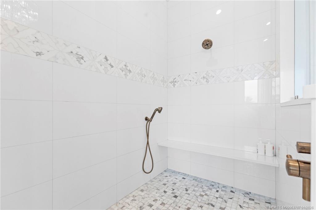 3 Island Road Stuart, FL 34996 - Photo 26 of 58 a bathroom with a shower