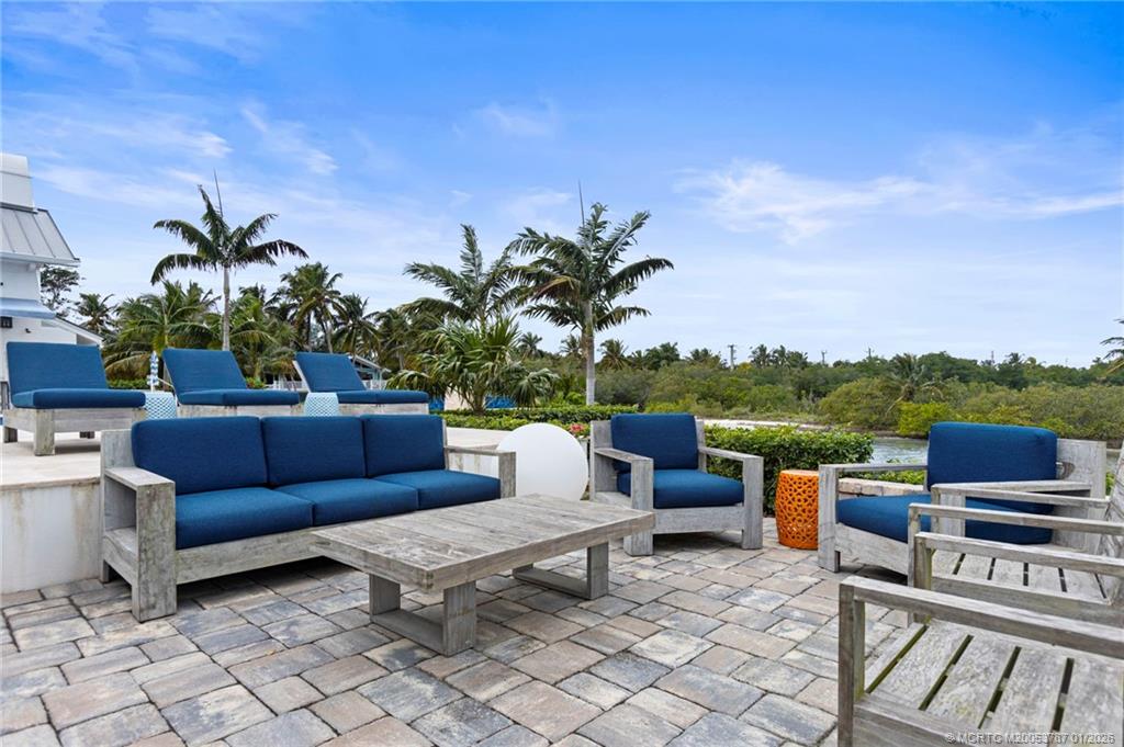 3 Island Road Stuart, FL 34996 - Photo 51 of 58 a view of a terrace with furniture