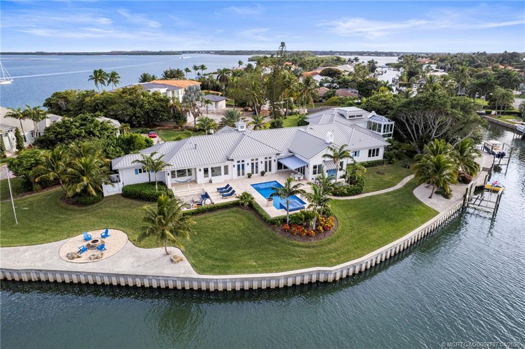 3 Island Road Sewall's Point, FL 34996 - Photo 59 of 59 an aerial view of a house with swimming pool and outdoor space