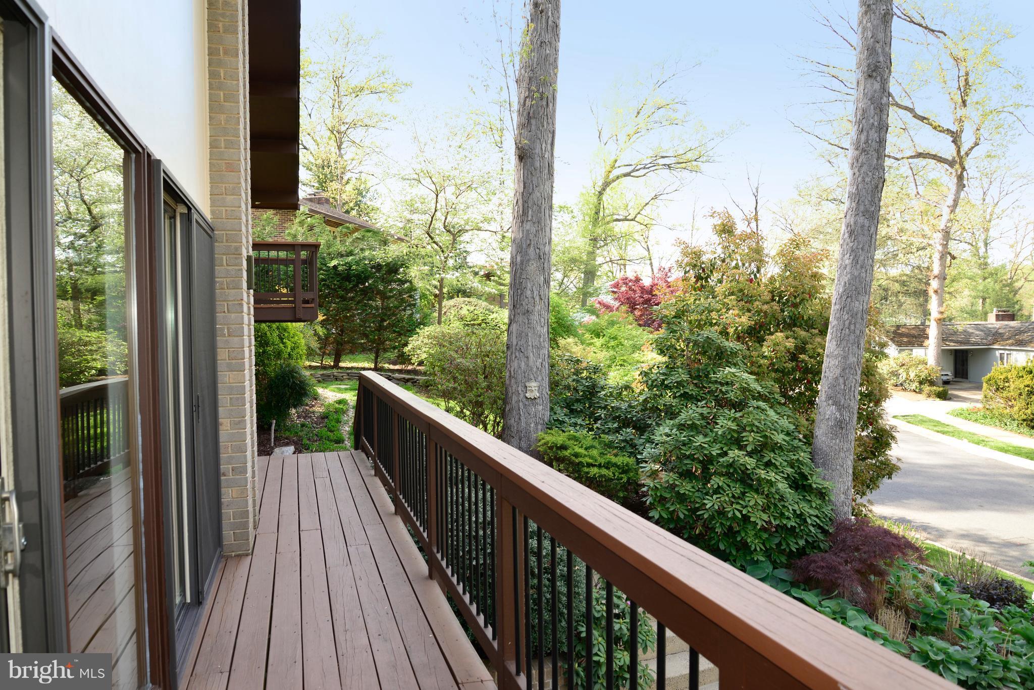 11303 South Shore Road Reston, VA 20190 - Photo 4 of 30 a view of a balcony with wooden floor