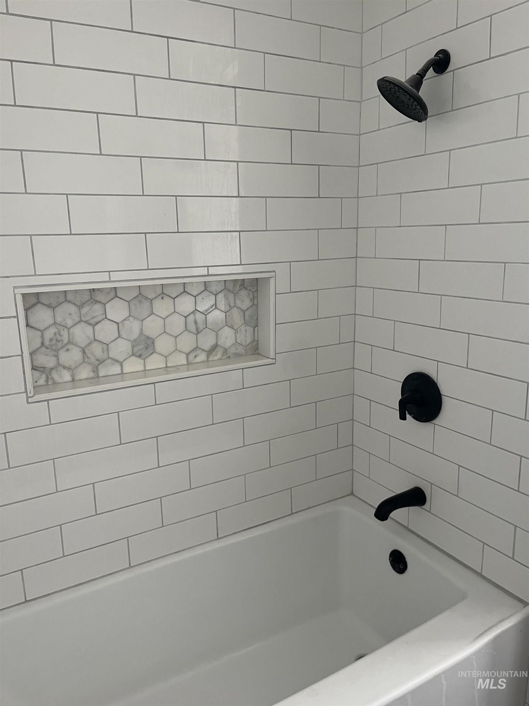 1024 El Cajon Street Moscow, ID 83843 - Photo 17 of 49 Full bath featuring bathing tub / shower combination