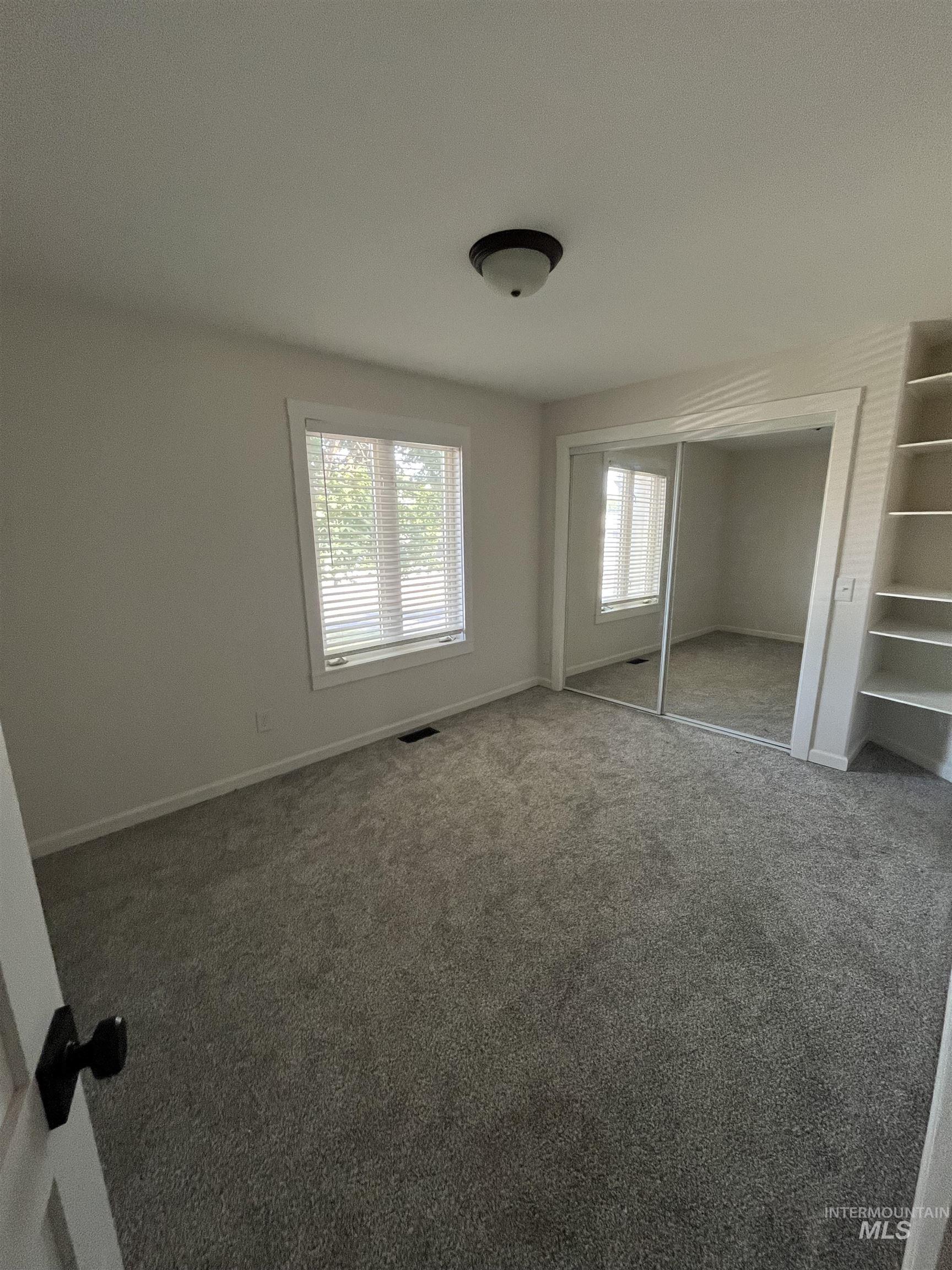 1024 El Cajon Street Moscow, ID 83843 - Photo 21 of 49 Unfurnished bedroom with carpet and baseboards