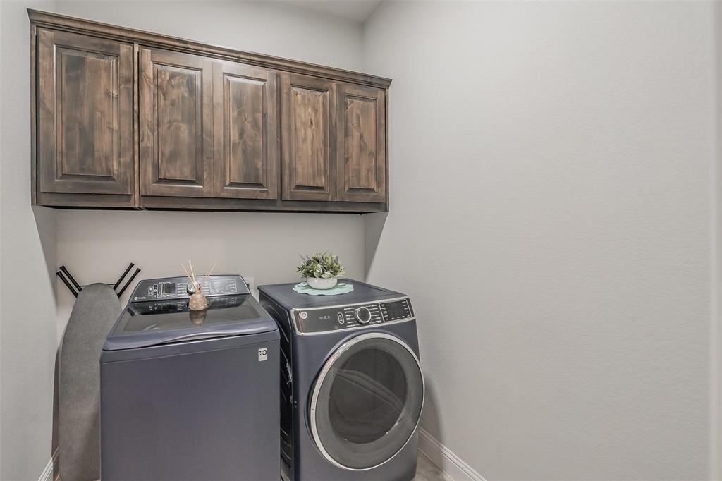 2230 County Road 2360 Decatur, TX 76234 - Photo 20 of 40 Features hardwood style tile flooring & a ceiling fan
