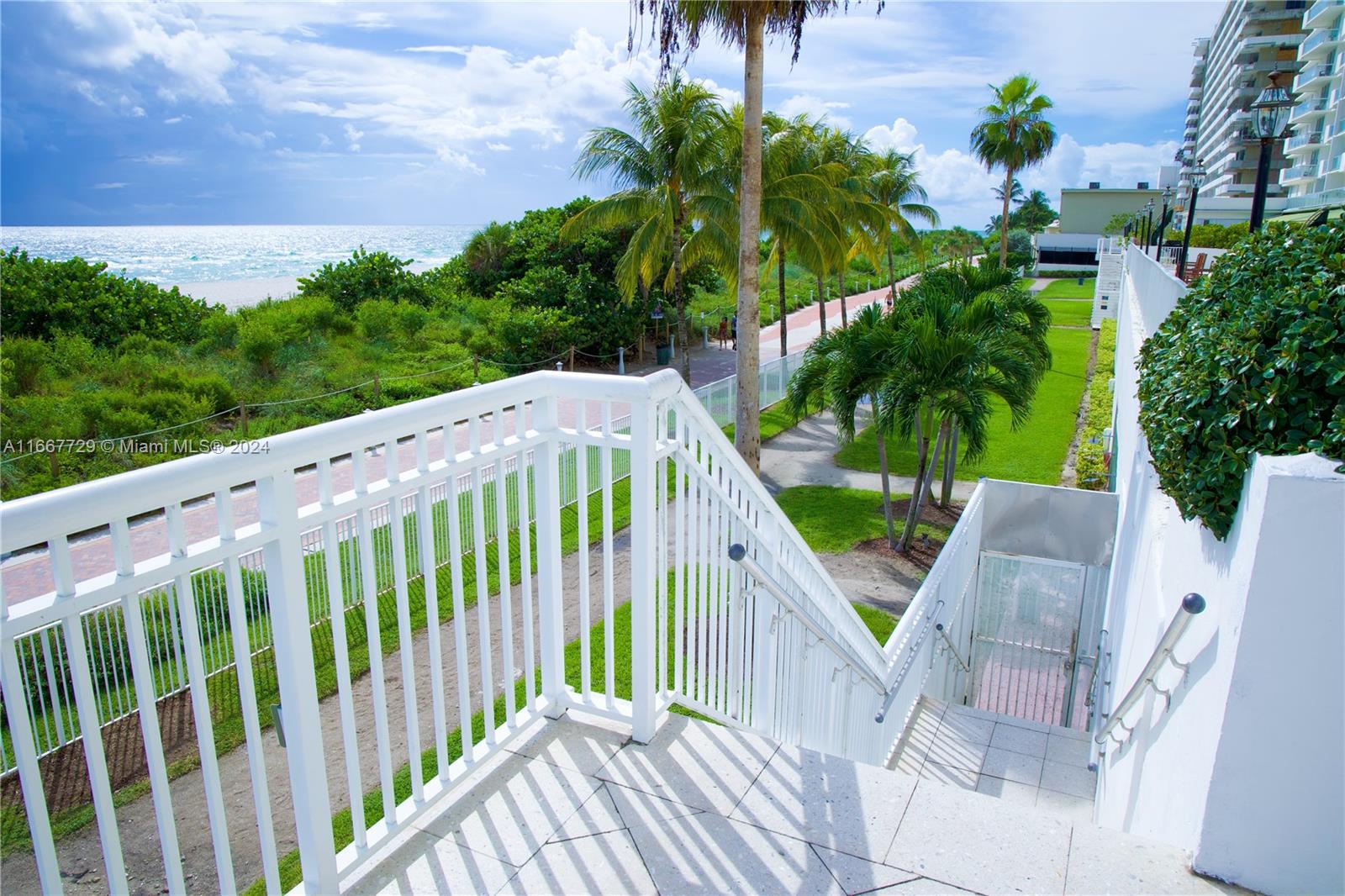 5601 Collins Avenue, Unit 1614 Miami Beach, FL 33140 - Photo 2 of 19 a view of a house with backyard and trees