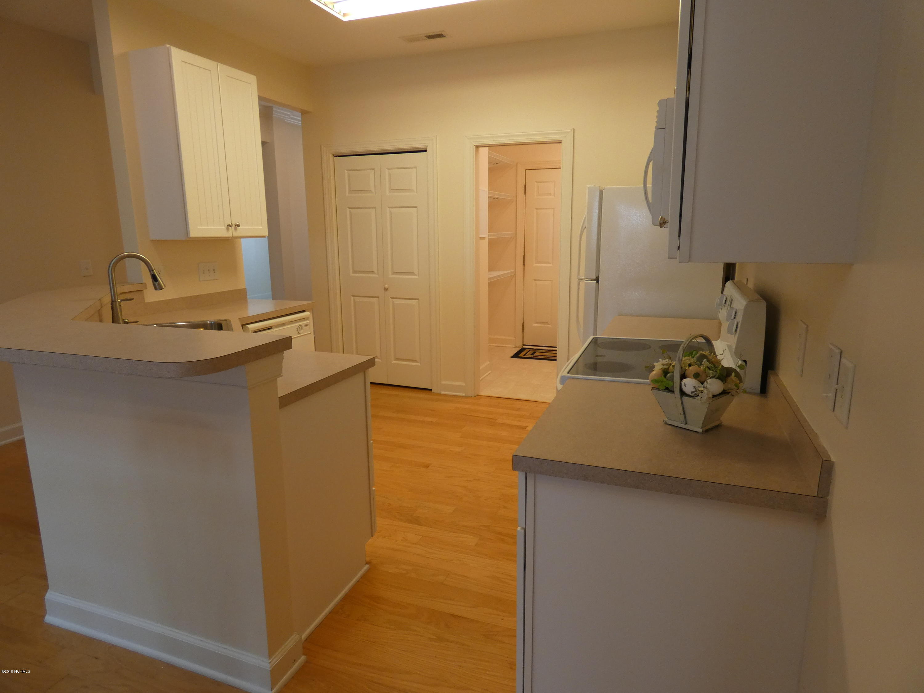 1306 Arbor Ridge Way Leland, NC 28451 - Photo 14 of 21 Very efficient Kichen with large pantry closet