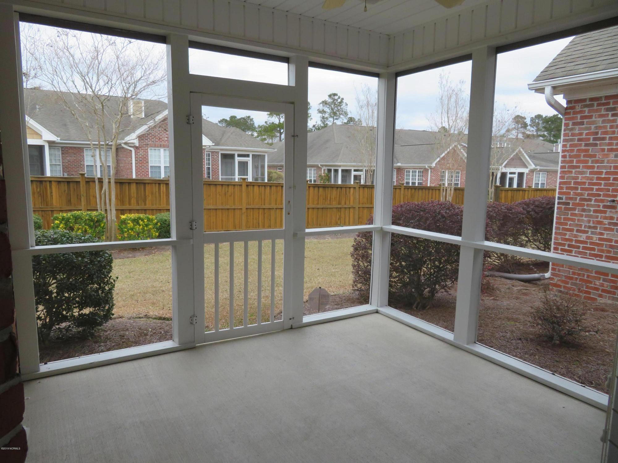 Another view of Rear Porch. Perfect for NC weather and for pets on a rainy day