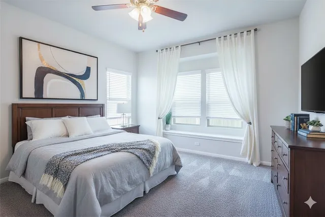 a kitchen with kitchen island granite countertop a sink stainless steel appliances and cabinets