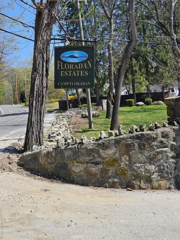 a view of a park with of a tree