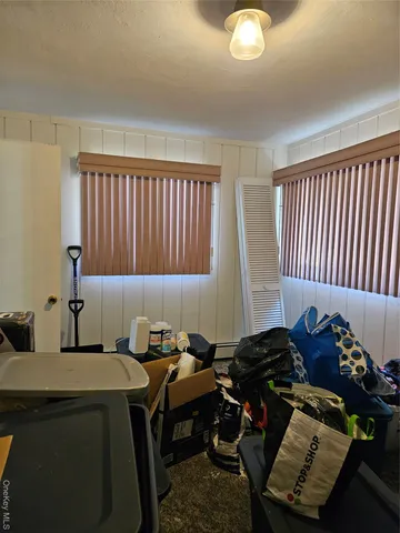 a room with furniture and a chair