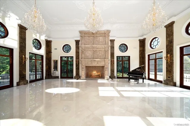 a view of a lobby with a table and a clock