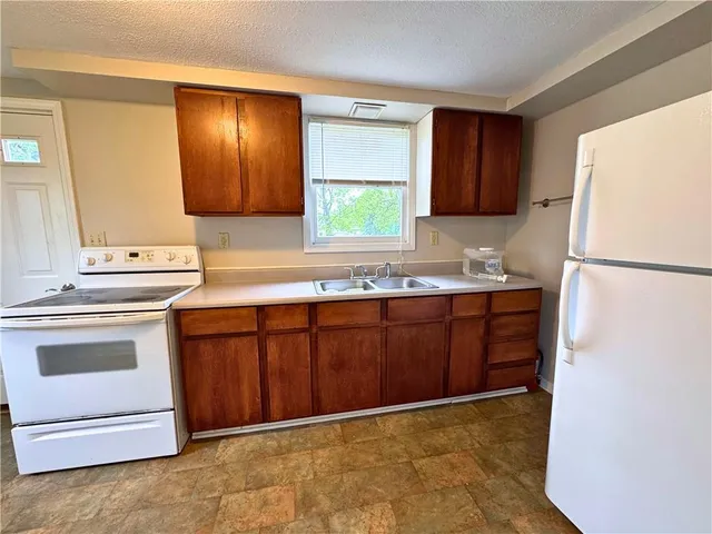a bathroom with a sink a vanity and mirror