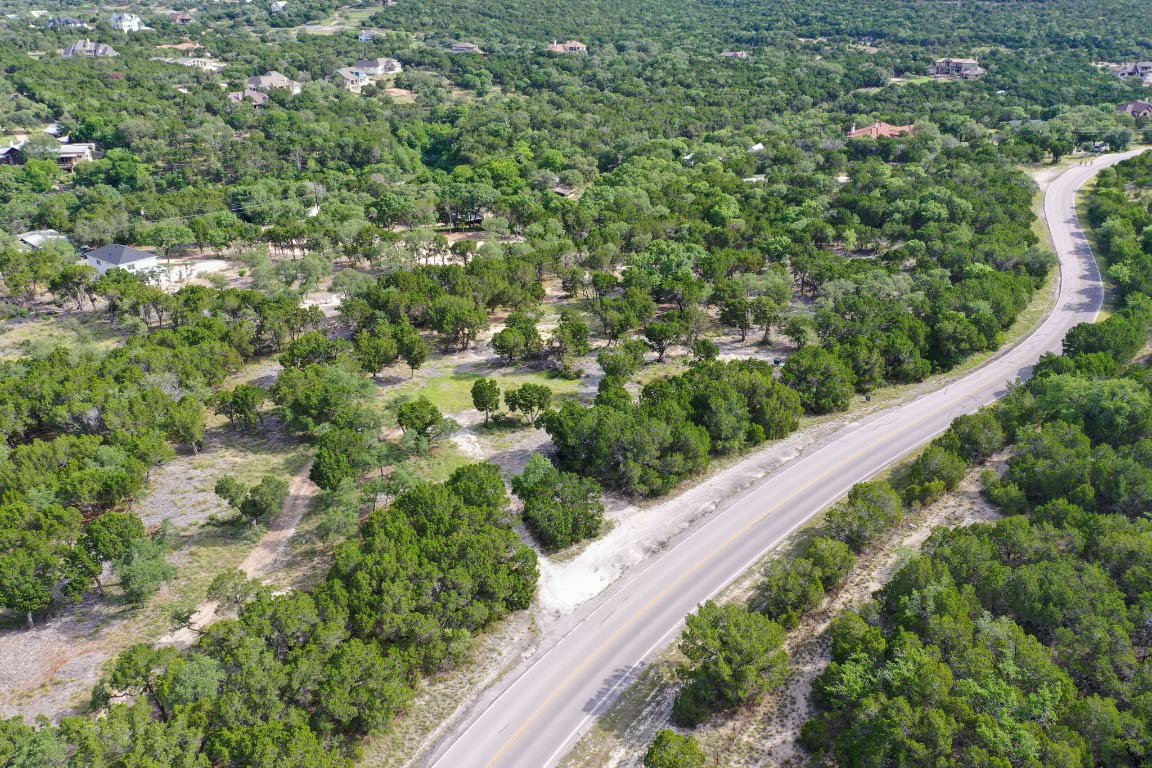 8000 Lime Creek Road Leander, TX 78641 - Photo 11 of 16 a view of a garden from a balcony