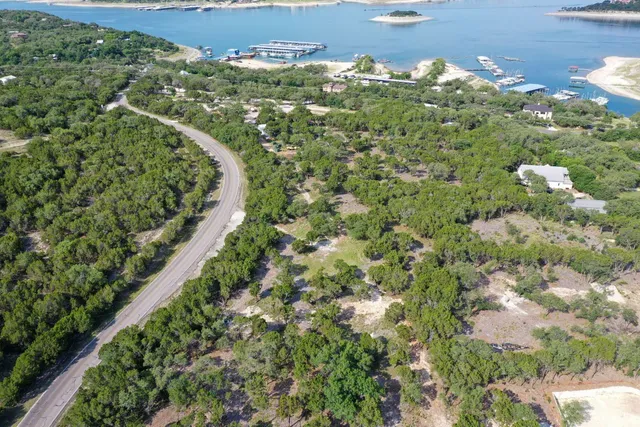 a view of a garden with a building