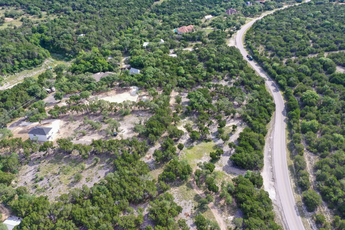 8000 Lime Creek Road Leander, TX 78641 - Photo 10 of 16 a view of a lush green forest with lots of trees