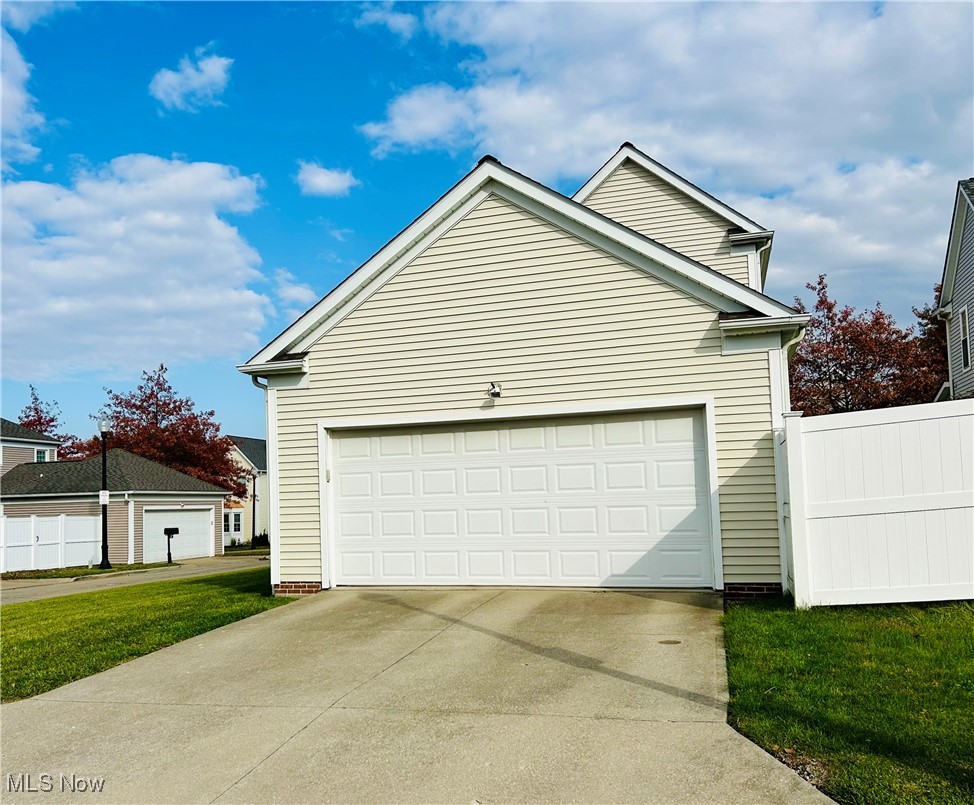 4420 Archer Road Cleveland, OH 44105 - Photo 13 of 18 Garage featuring concrete driveway