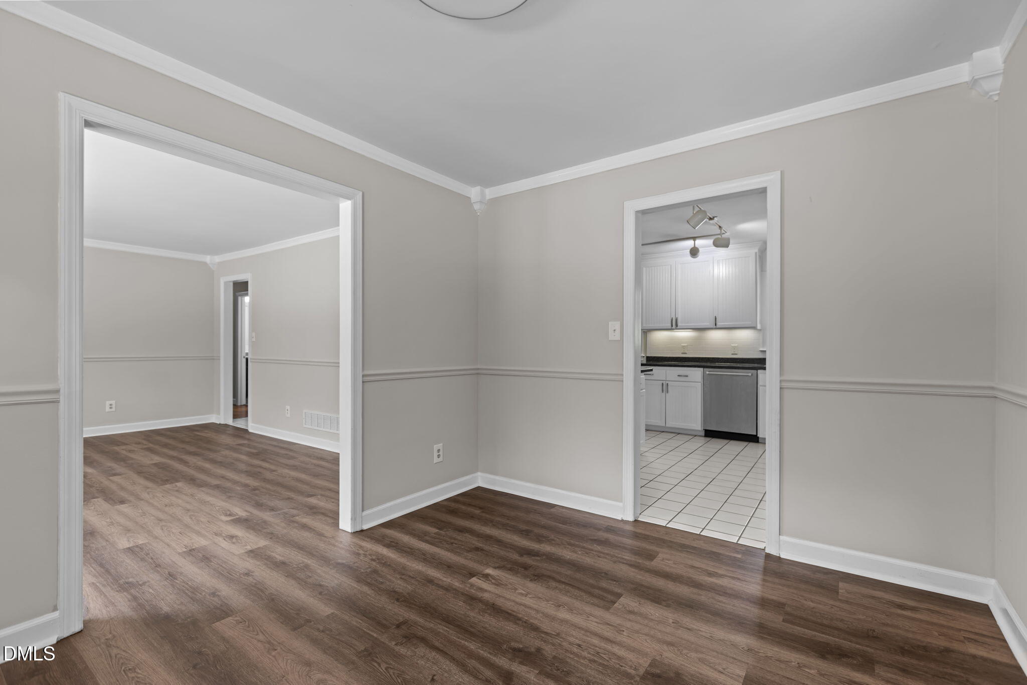 3117 Edgetone Drive Raleigh, NC 27604 - Photo 10 of 50 a view of empty room with wooden floor