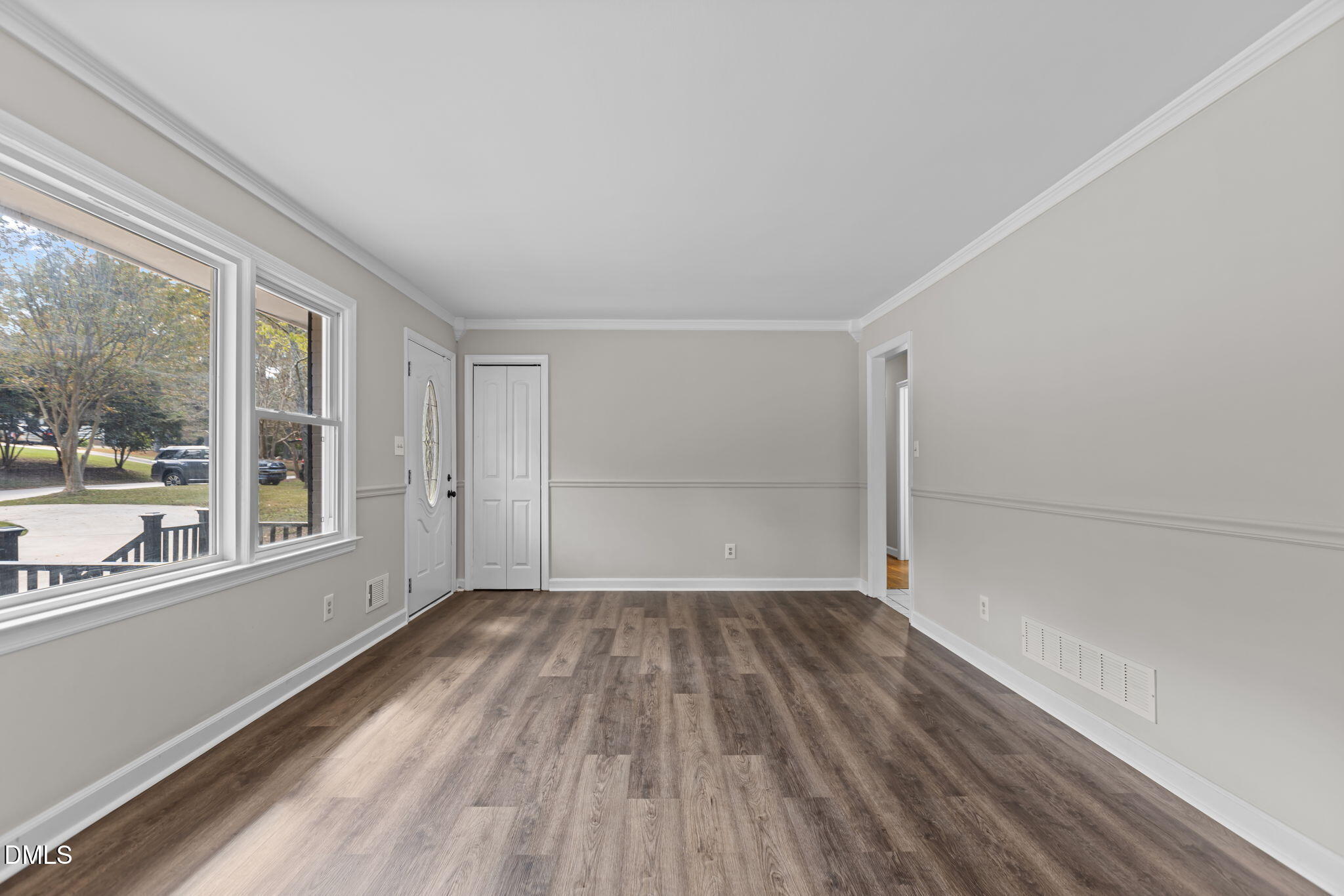 3117 Edgetone Drive Raleigh, NC 27604 - Photo 6 of 50 wooden floor in an empty room with a window