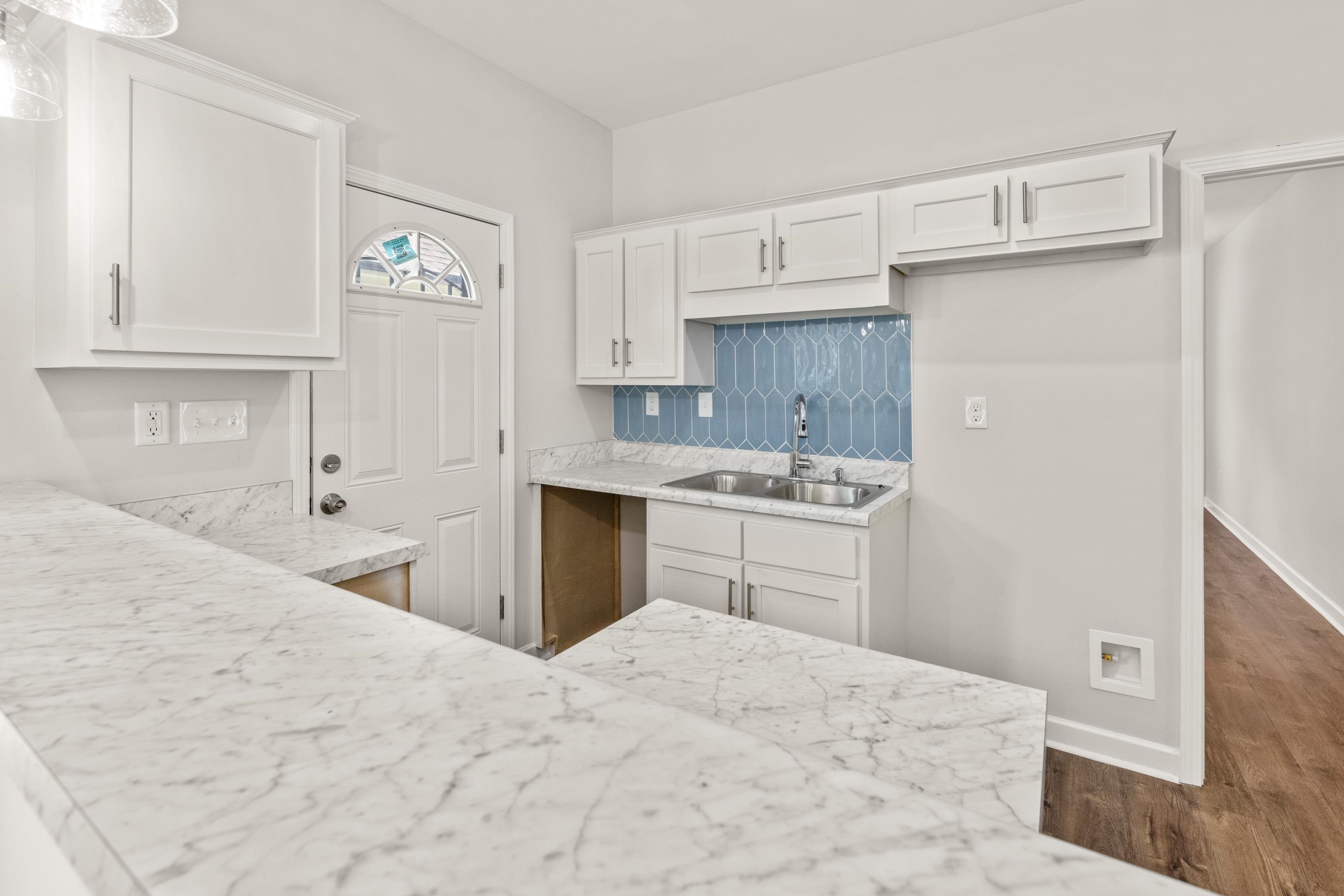 820 Semmes Street Memphis, TN 38111 - Photo 9 of 15 a kitchen with a sink cabinets and window