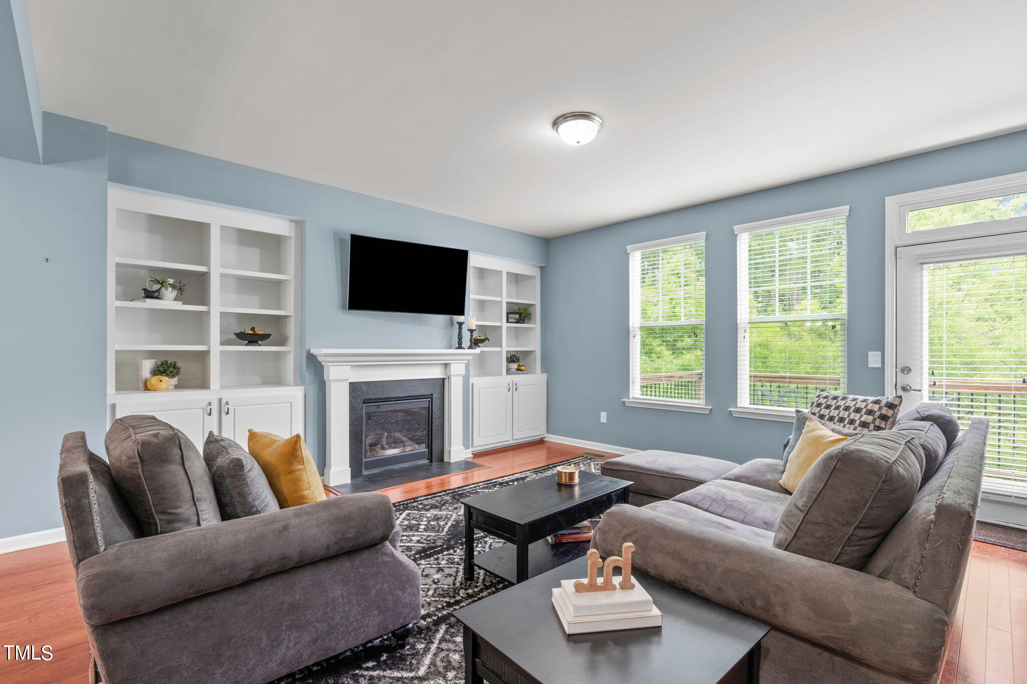 624 Edgewater Ridge Court Apex, NC 27523 - Photo 17 of 38 Look at these gorgeous built-ins.