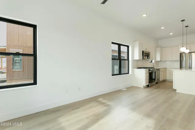 a view of kitchen and window