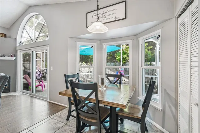 a view of a dining room with furniture