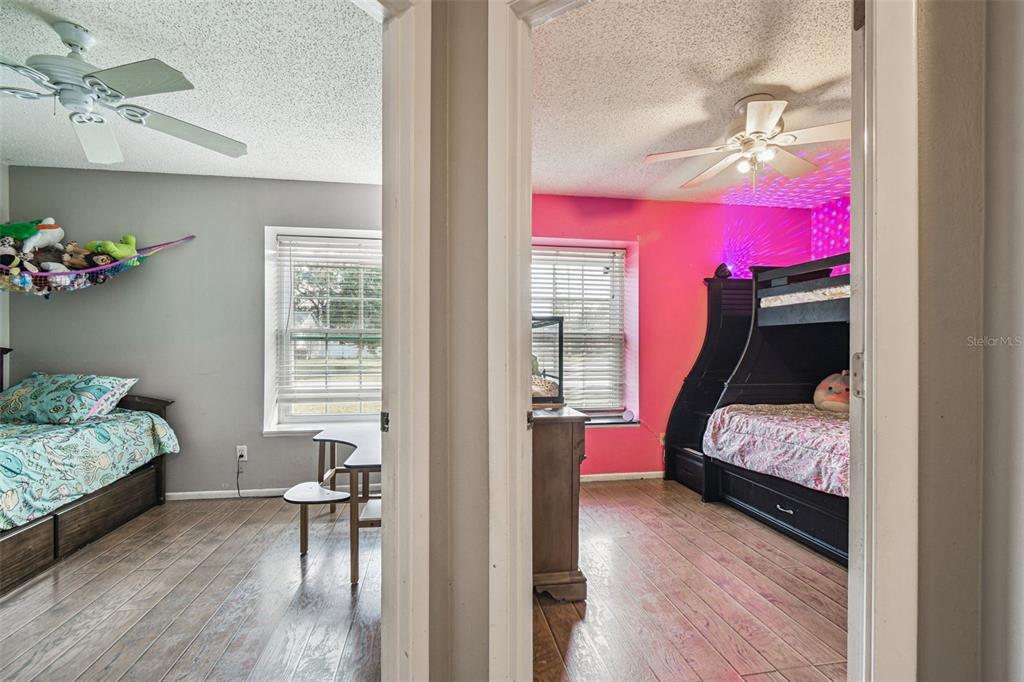 7501 Fawn Lake Road New Port Richey, FL 34655 - Photo 19 of 27 a bedroom with furniture and a window
