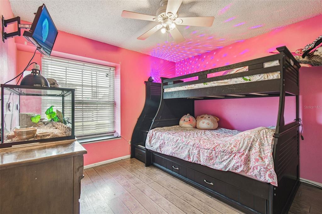 7501 Fawn Lake Road New Port Richey, FL 34655 - Photo 20 of 27 a bedroom with a bed and a window