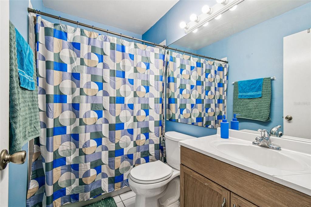 7501 Fawn Lake Road New Port Richey, FL 34655 - Photo 21 of 27 a bathroom with a sink and a mirror