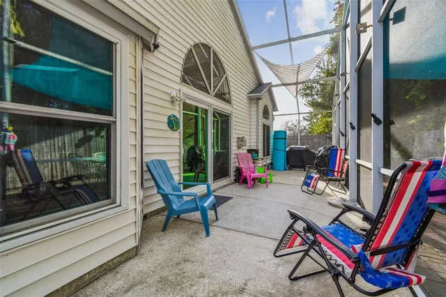 a view of a backyard with a patio
