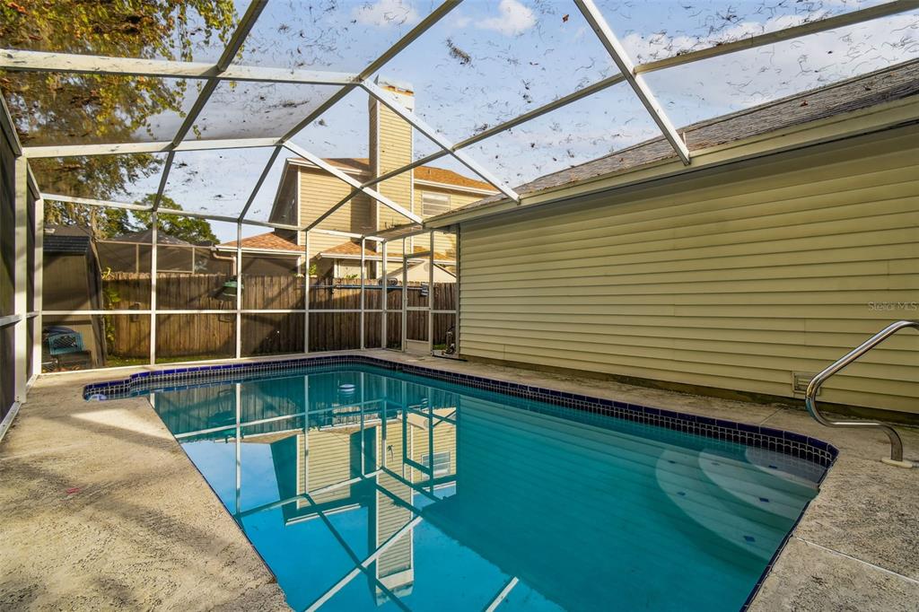 7501 Fawn Lake Road New Port Richey, FL 34655 - Photo 25 of 27 a view of a backyard with a patio