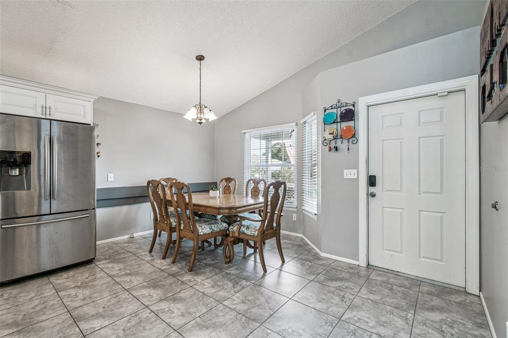 7501 Fawn Lake Road New Port Richey, FL 34655 - Photo 7 of 27 a dining room well furnished