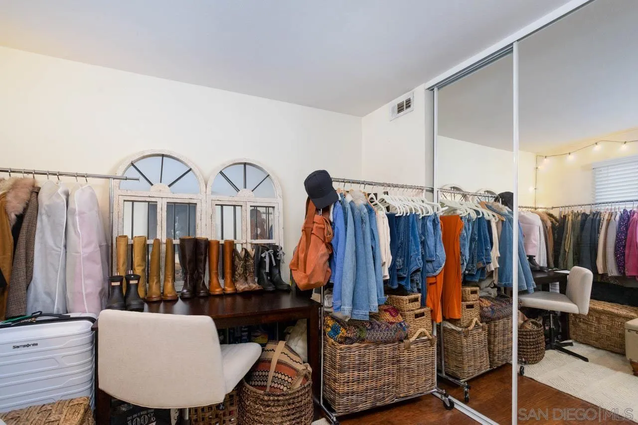 180 Chambers Street, Unit 4 El Cajon, CA 92020 - Photo 15 of 27 a view of walk in closet with clothes