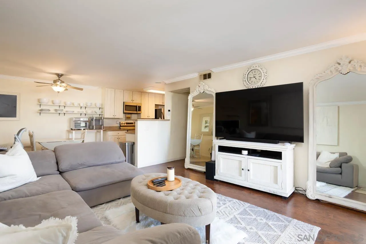 180 Chambers Street, Unit 4 El Cajon, CA 92020 - Photo 2 of 27 a living room with furniture and a flat screen tv