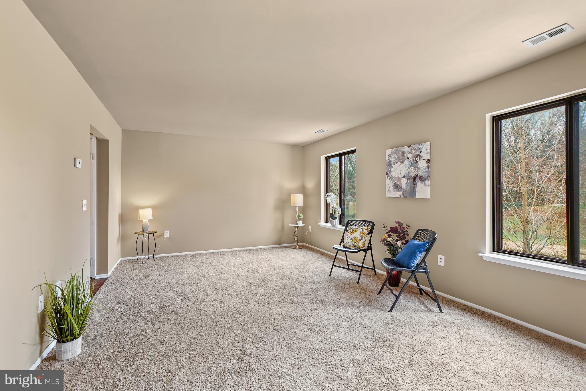 3136 Adderley Court, Unit 243G Silver Spring, MD 20906 - Photo 4 of 41 Living Room with Fresh Paint and Carpet.