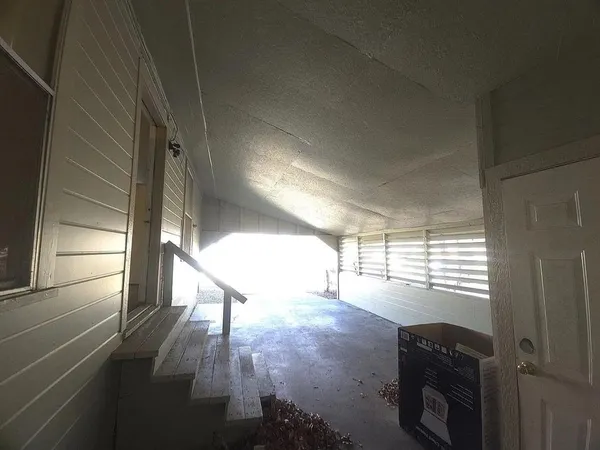 a room with window and stairs