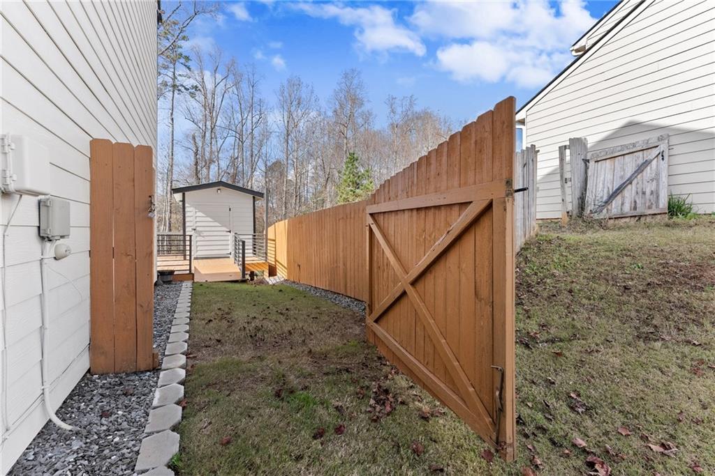 4302 Box Elder Path Gainesville, GA 30504 - Photo 32 of 53 a view of a house with a yard