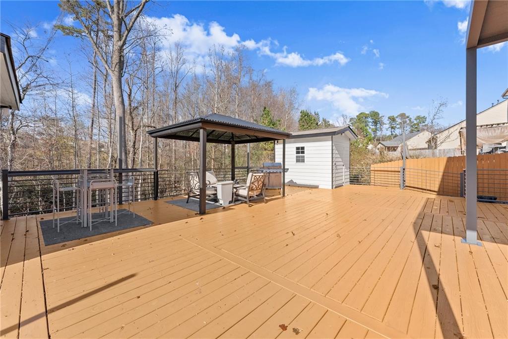 4302 Box Elder Path Gainesville, GA 30504 - Photo 35 of 53 a view of a backyard with a patio