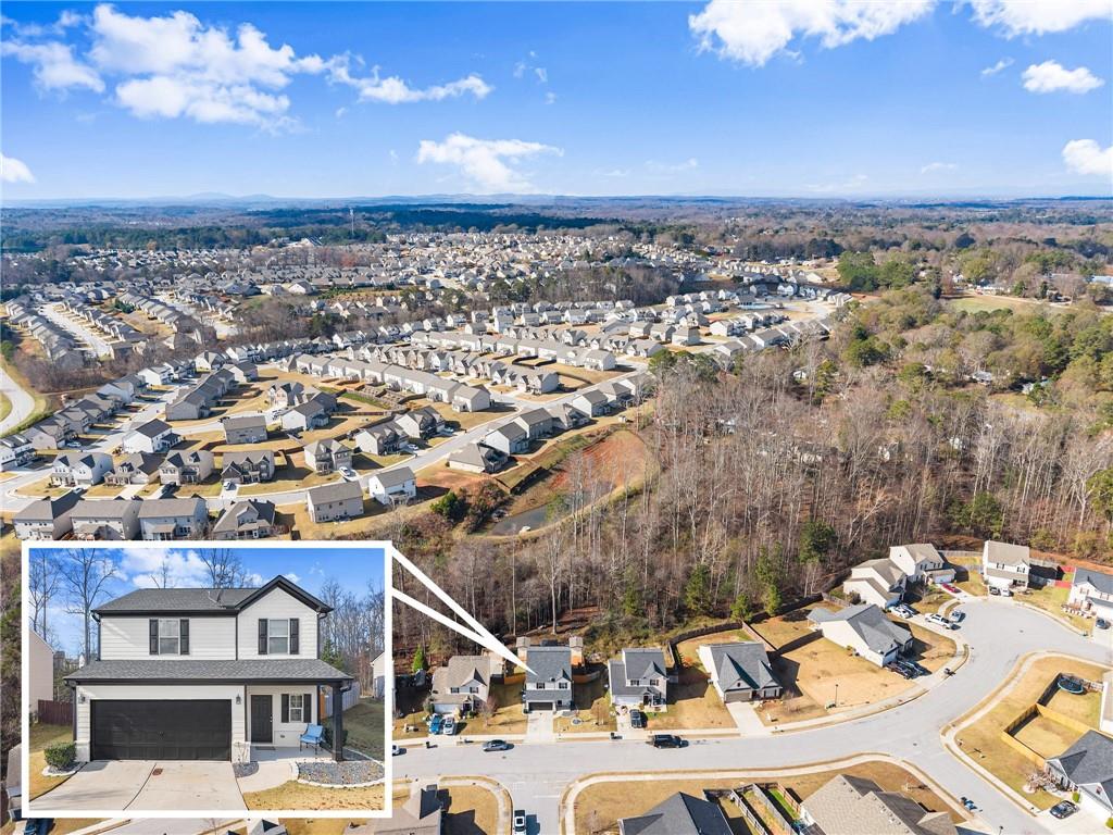 4302 Box Elder Path Gainesville, GA 30504 - Photo 48 of 53 a view of a city that has tall buildings