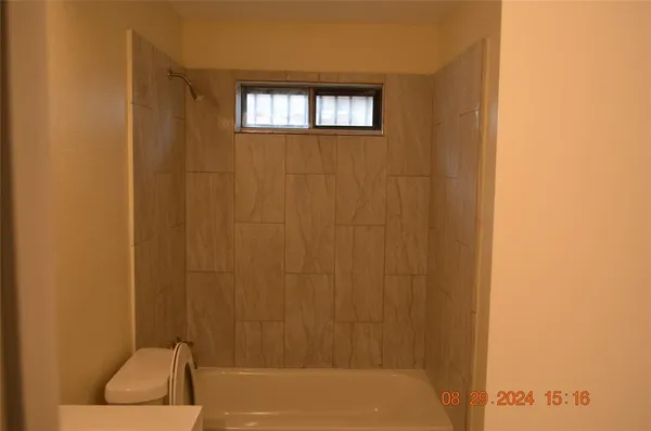 a bathroom with a bathtub