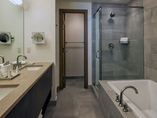 a bathroom with a sink and mirror