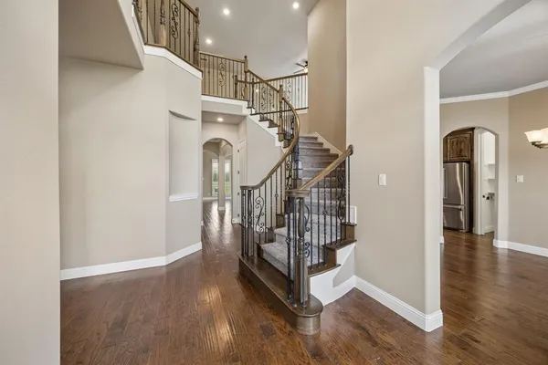 a view of entryway with wooden floor