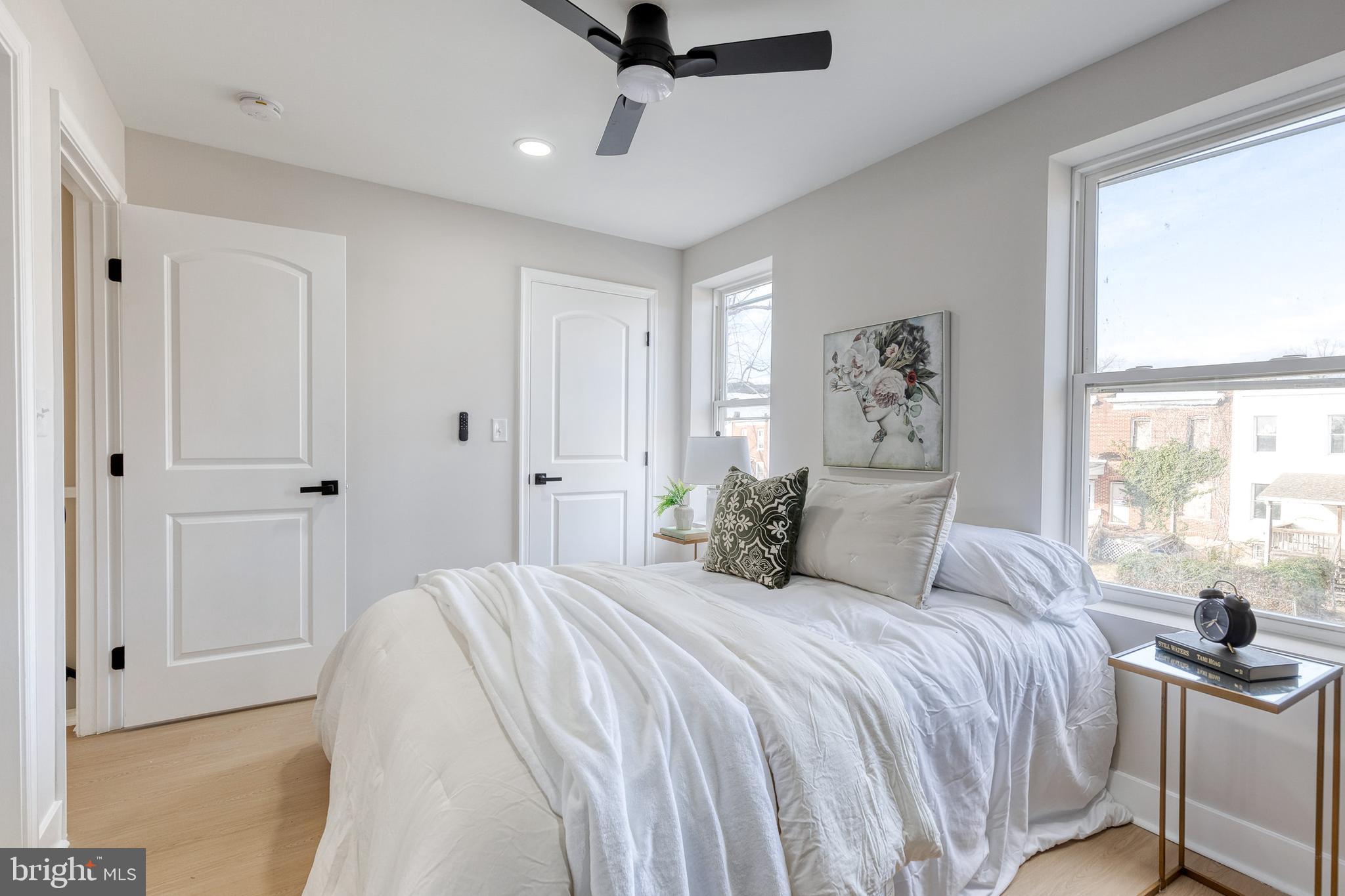 3721 Manchester Avenue Baltimore, MD 21215 - Photo 24 of 36 a bedroom with a bed and a window