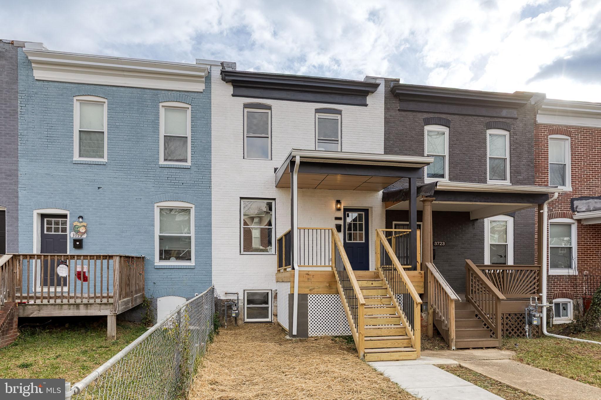 3721 Manchester Avenue Baltimore, MD 21215 - Photo 3 of 36 a view of a house with wooden deck