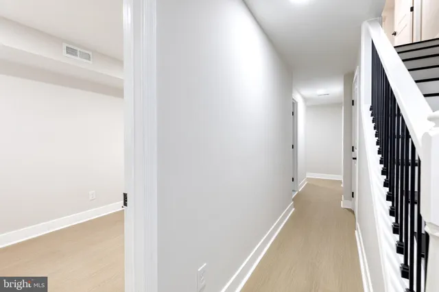 a view of a hallway with entryway