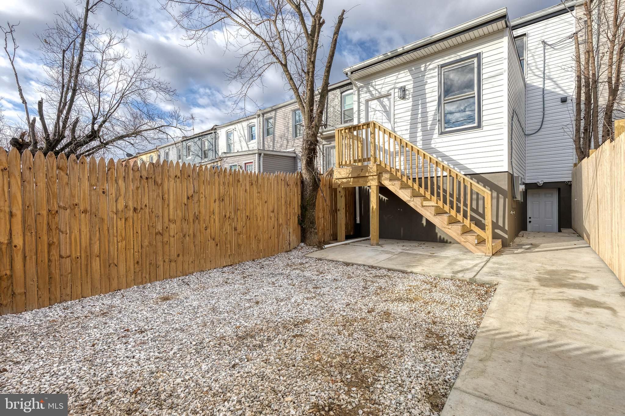 3721 Manchester Avenue Baltimore, MD 21215 - Photo 36 of 36 a view of a house with a yard