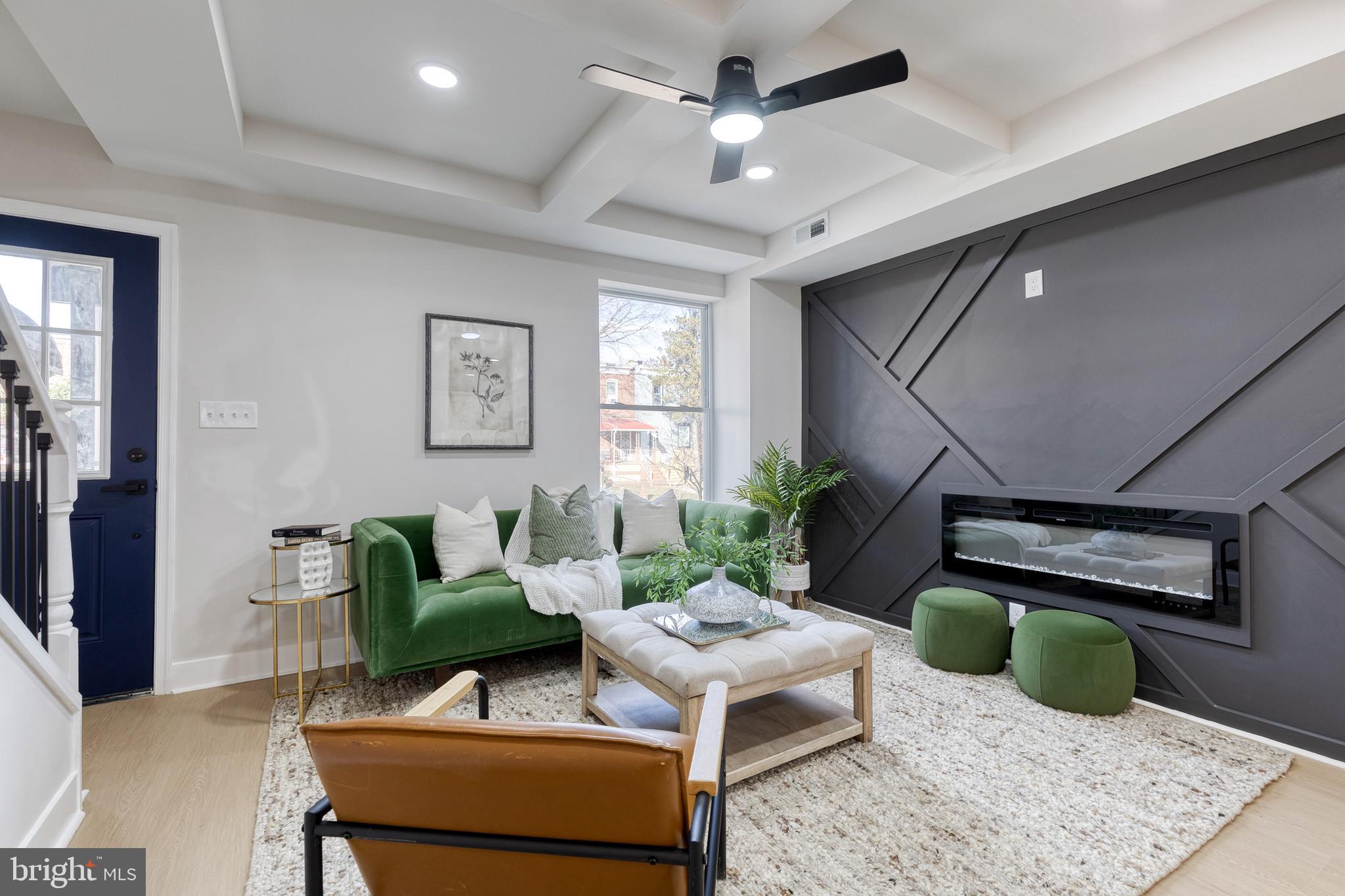 3721 Manchester Avenue Baltimore, MD 21215 - Photo 7 of 36 a living room with furniture and a wooden floor