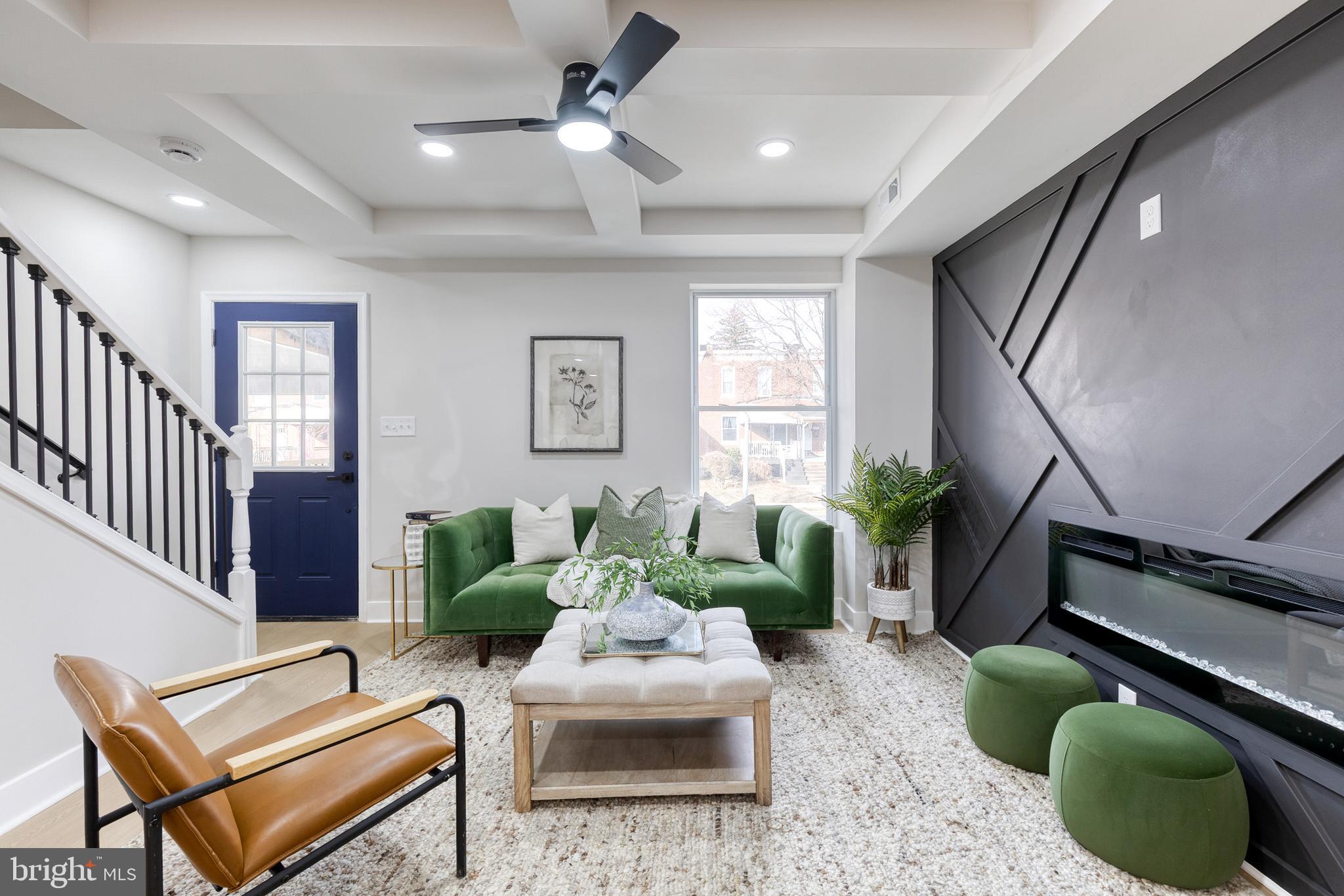 3721 Manchester Avenue Baltimore, MD 21215 - Photo 8 of 36 a living room with furniture and a window